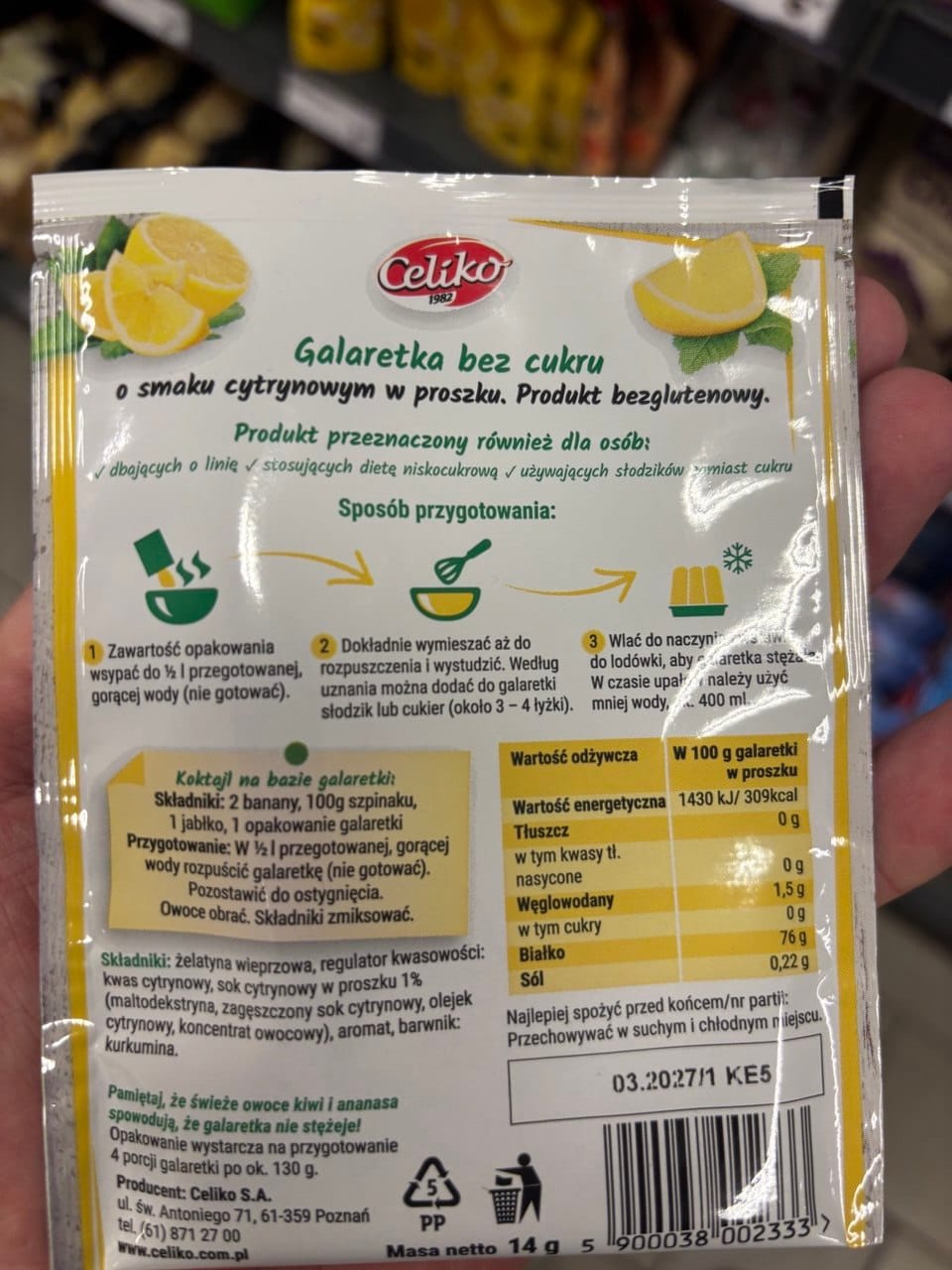 Tył saszetki cytrynowej galaretki bez cukru Celiko z ilustrowaną instrukcją przygotowania w trzech krokach, tabelą wartości odżywczych, masą netto 14 g oraz kodem kreskowym.